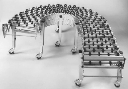 Transportador extensible de roldanes
